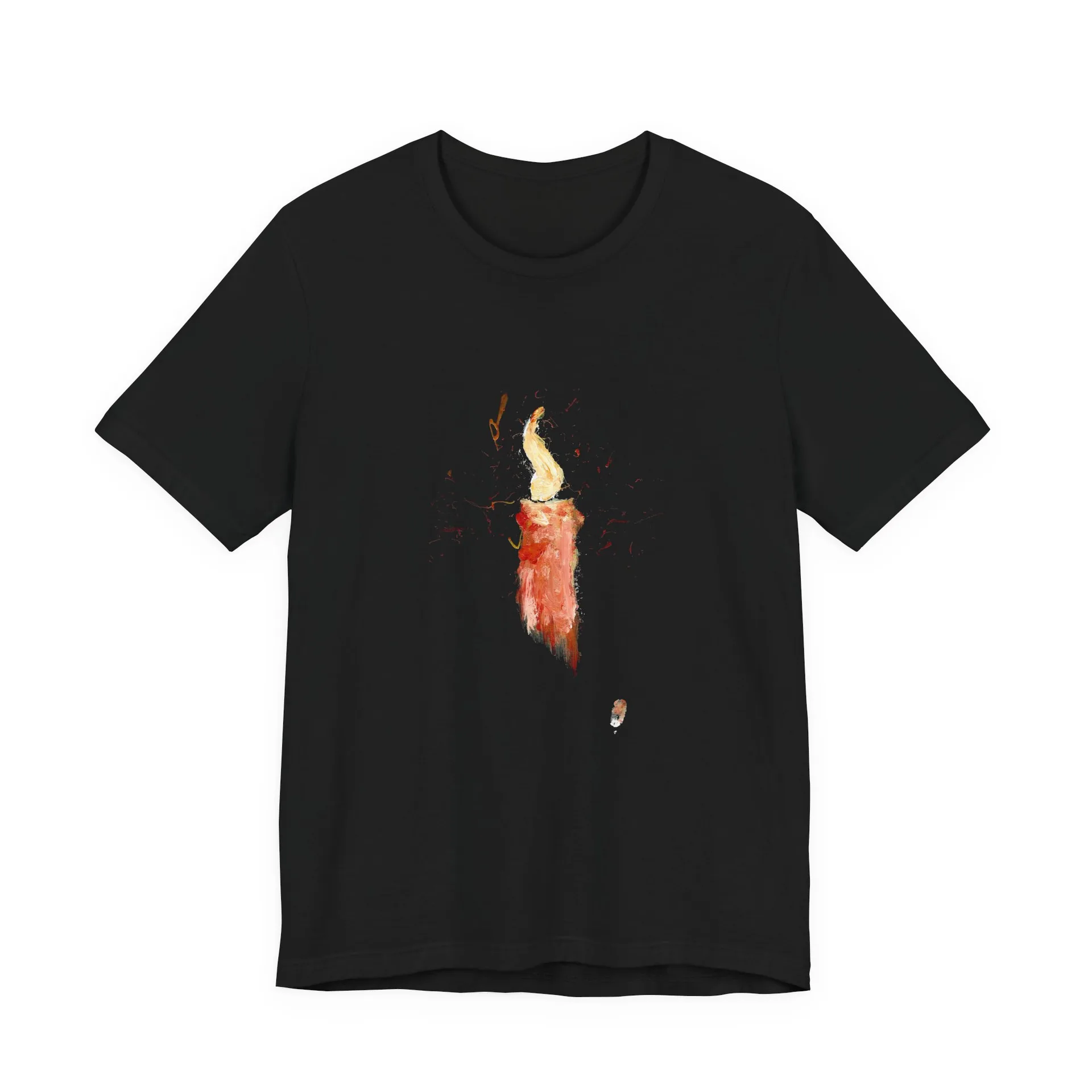 A black crew-neck t-shirt laid flat, printed at the chest with a painted red candle and its tall pale flame, sparks of red and orange flicking outward.