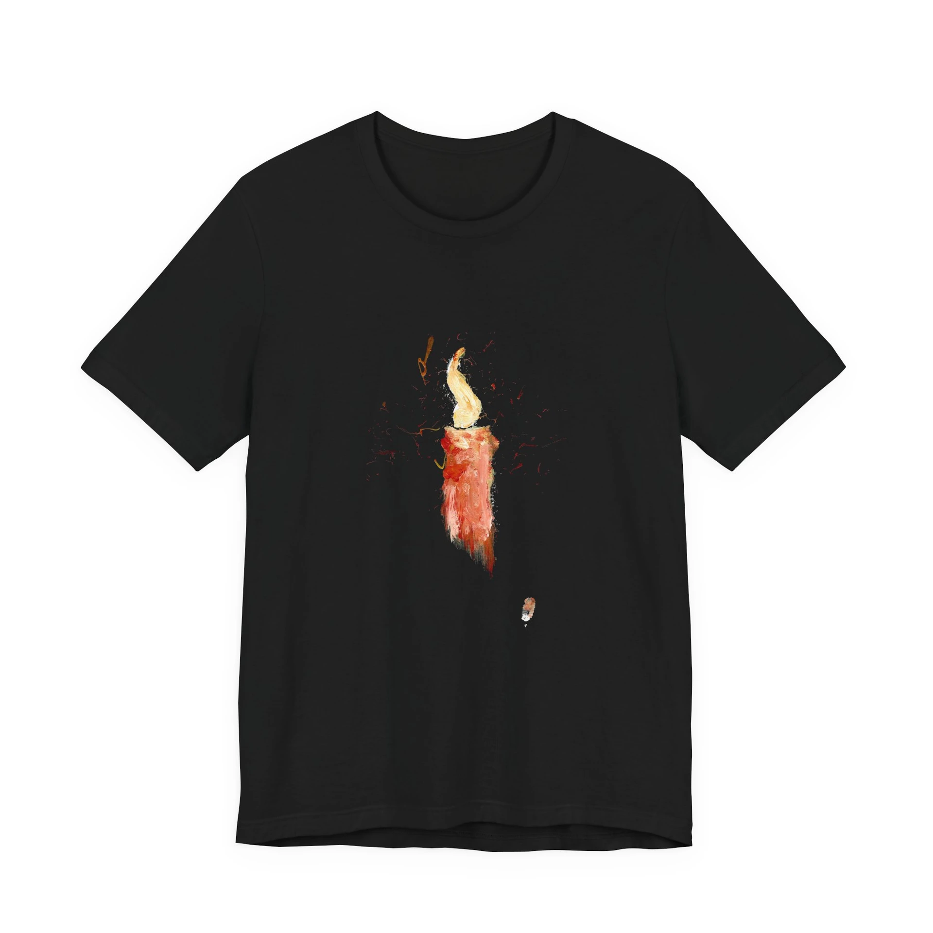 A black crew-neck t-shirt laid flat, printed at the chest with a painted red candle and its tall pale flame, sparks of red and orange flicking outward.